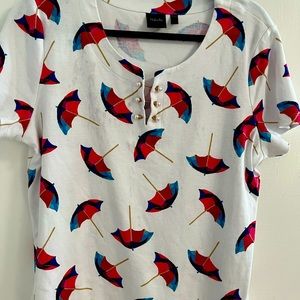 Darling Raffaella Studio XLP tee with cute umbrellas and pearl neck.